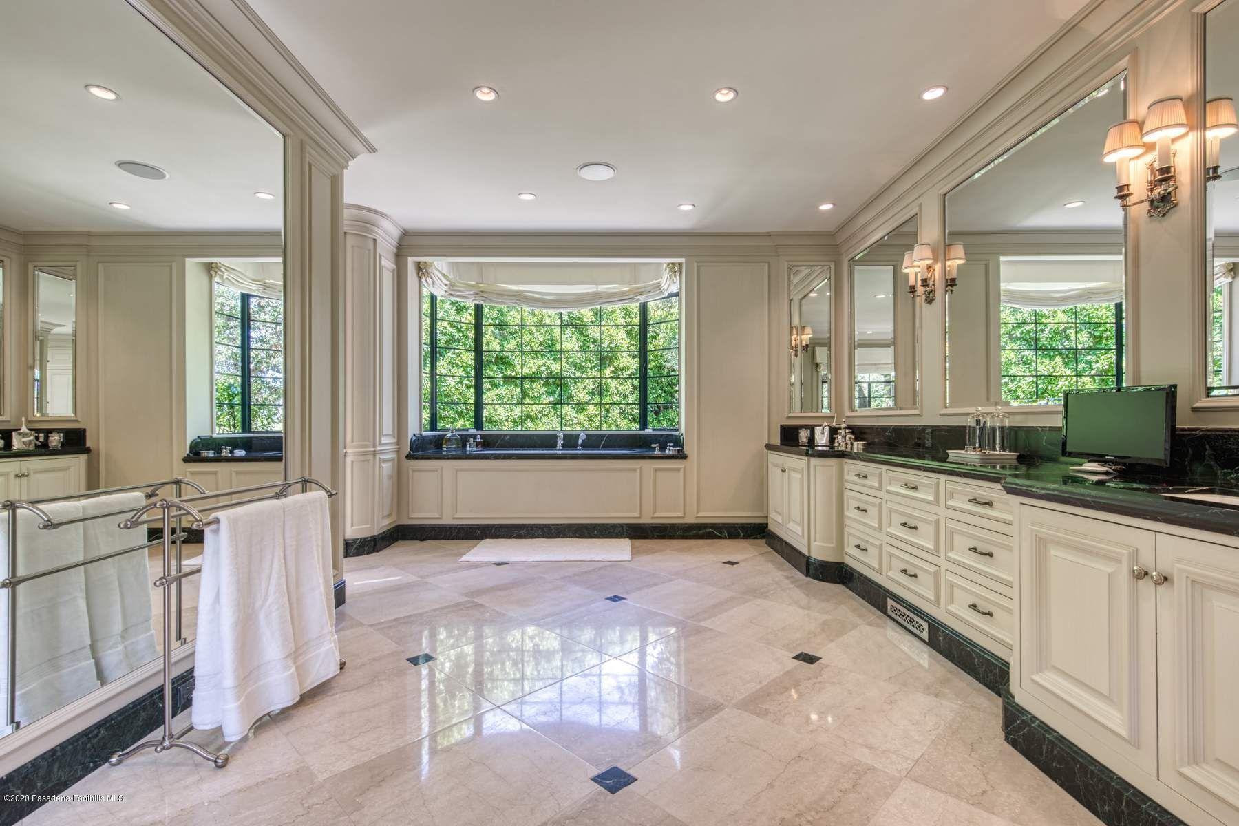 400 South San Rafael Avenue Pasadena, CA 91105 - Photo 21 of 49 a large white kitchen with a large window
