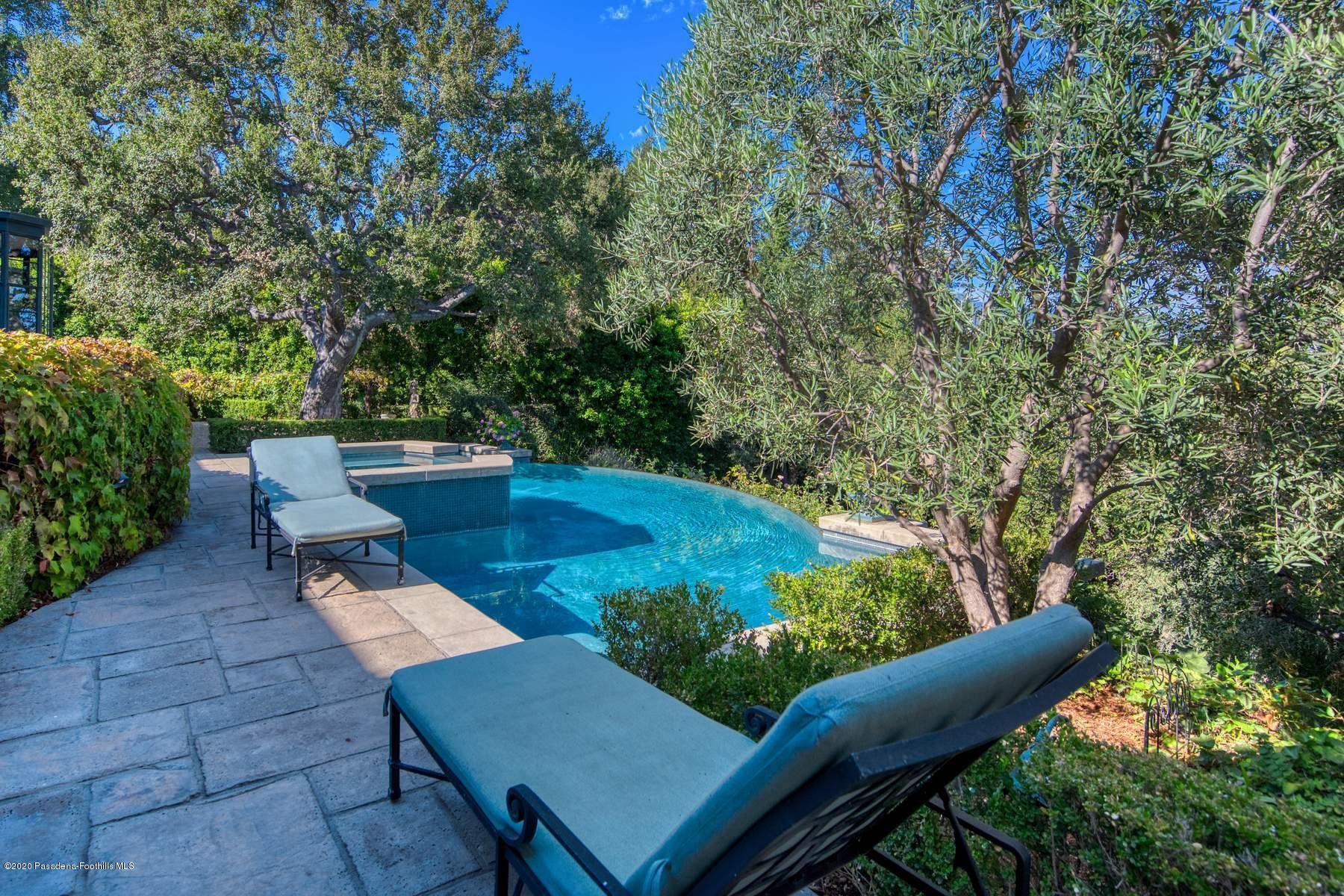 400 South San Rafael Avenue Pasadena, CA 91105 - Photo 32 of 49 a backyard of a house with outdoor seating