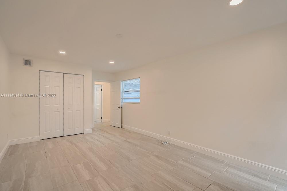115 West Mango Road Lake Worth, FL 33467 - Photo 21 of 32 a view of an empty room