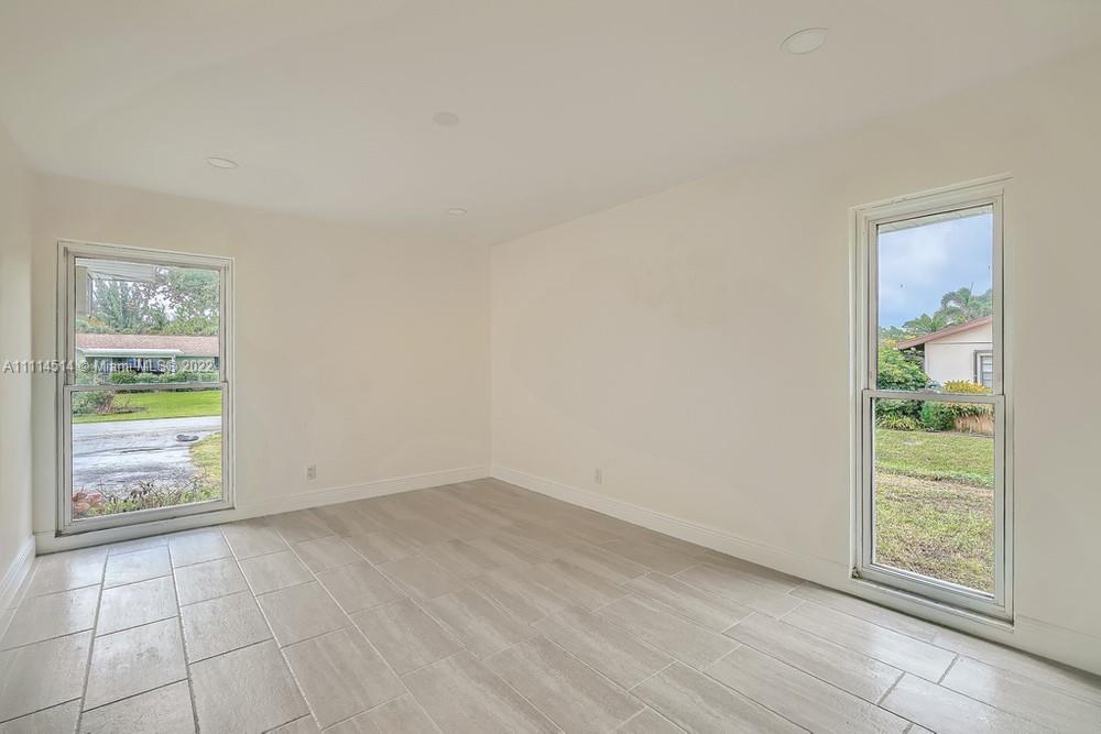 115 West Mango Road Lake Worth, FL 33467 - Photo 22 of 32 an empty room with windows