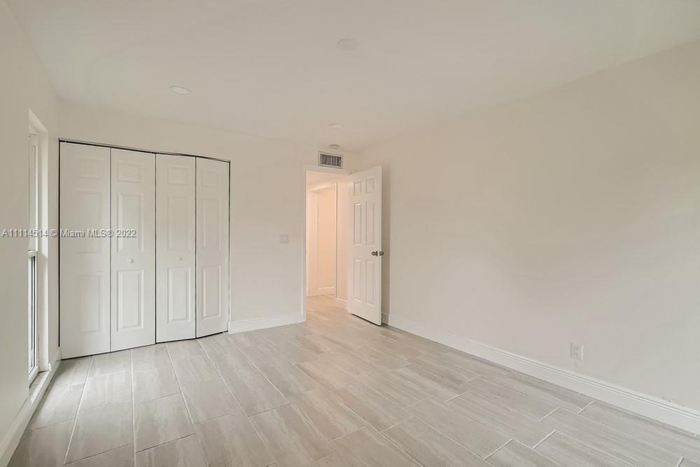 115 West Mango Road Lake Worth, FL 33467 - Photo 24 of 32 a view of an empty room