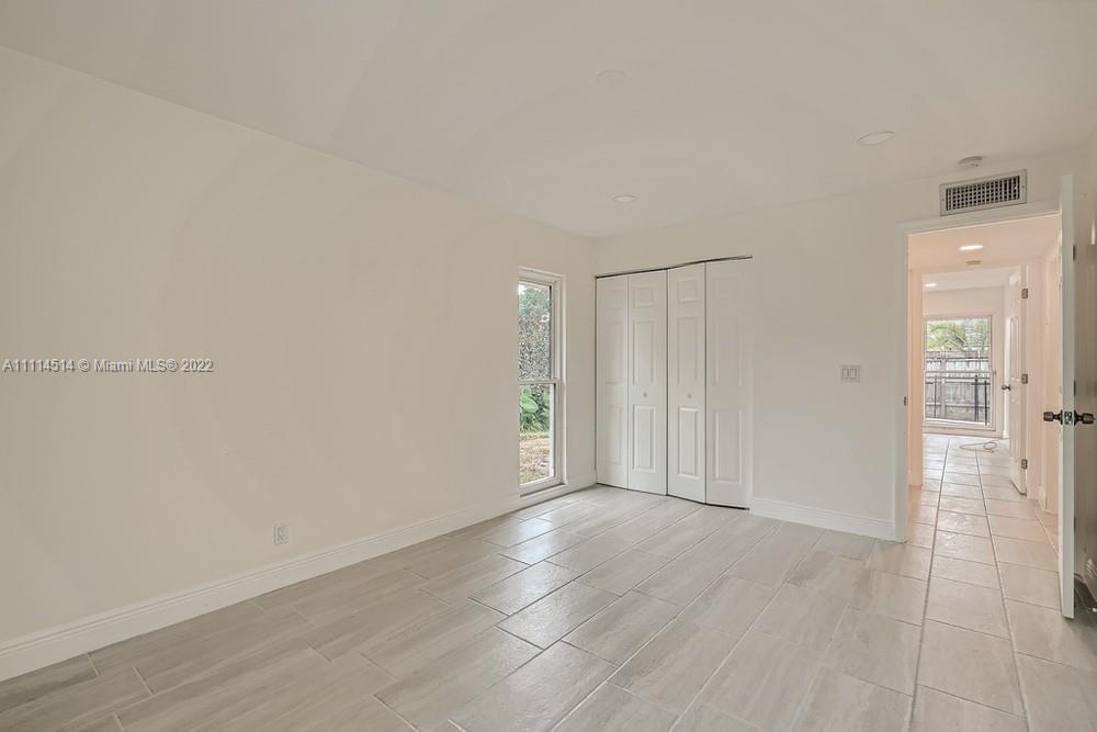 115 West Mango Road Lake Worth, FL 33467 - Photo 25 of 32 a view of an empty room