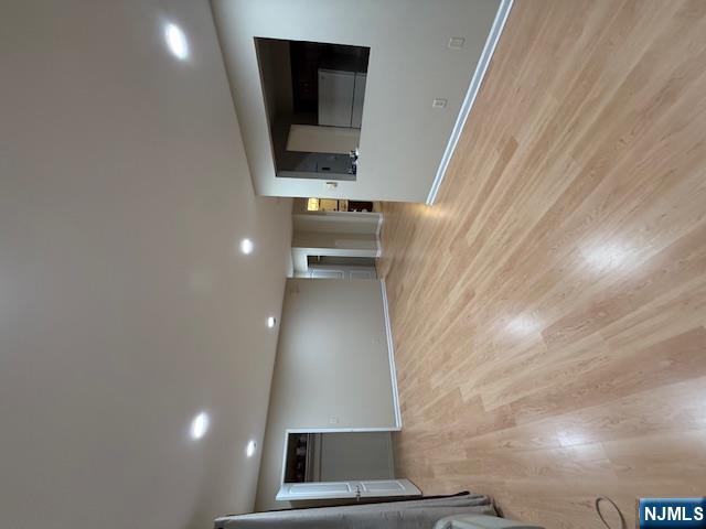 177 North Maple Avenue, Unit 177 Park Ridge, NJ 07656 - Photo 3 of 12 a view of empty room with wooden floor