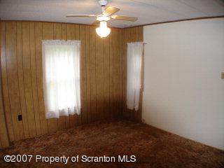 38 A Rr Wyalusing Pa Wyalusing, PA 18853 - Photo 2 of 4 a view of an empty room with a window