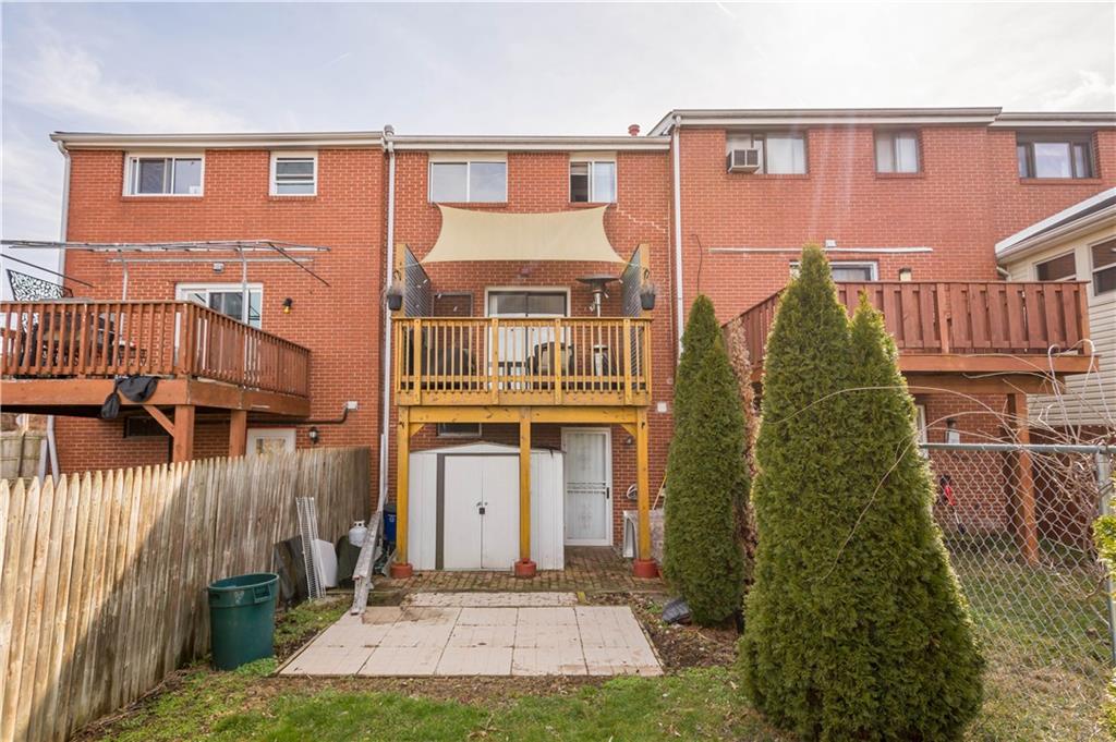 1731 Cliff Street Pittsburgh, PA 15219 - Photo 8 of 23 a front view of a house with a yard