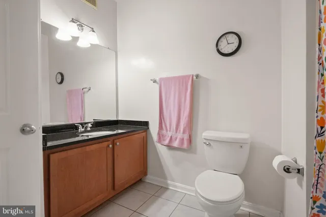 a view of a bathroom from the hallway