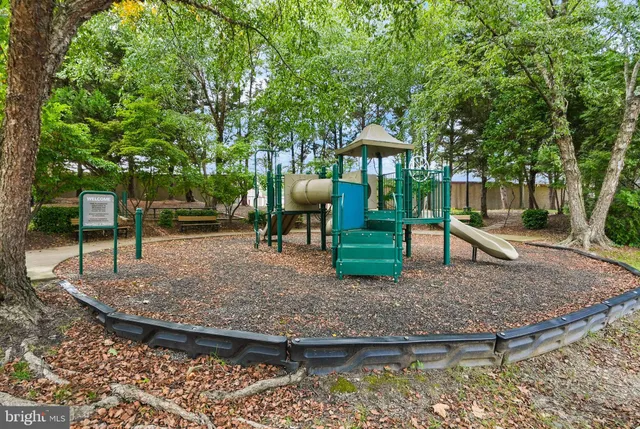 a view of hallway with furniture and a yard