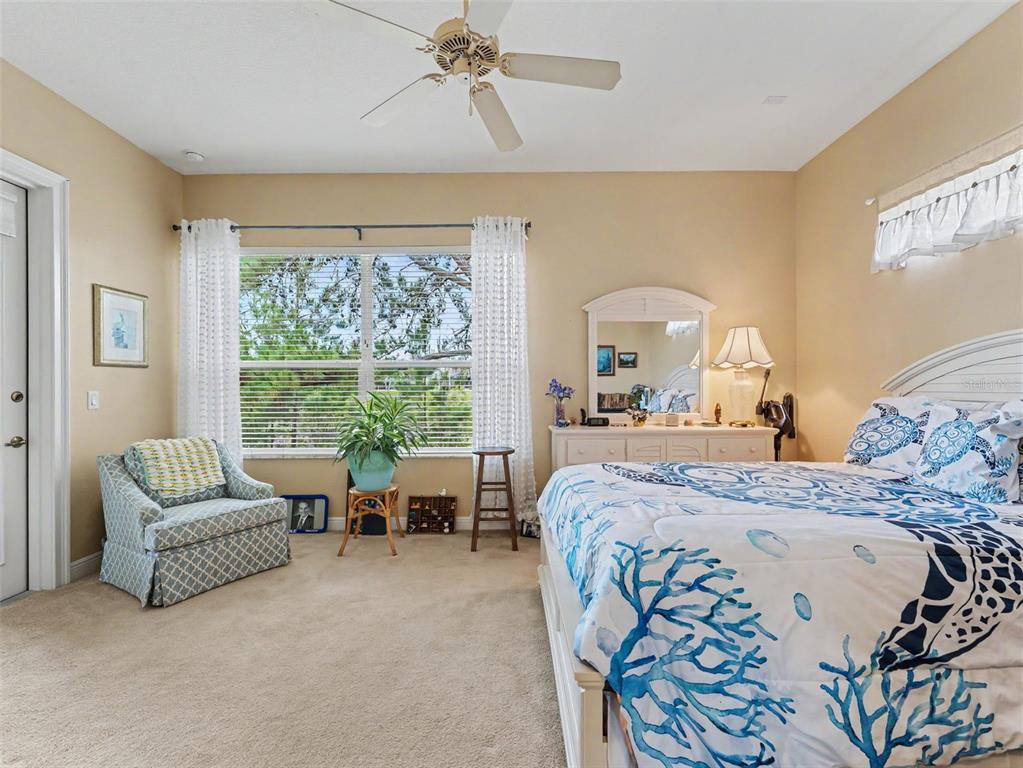 8910 Jericho Road Weeki Wachee, FL 34613 - Photo 32 of 52 a bed room with a bed and a couch