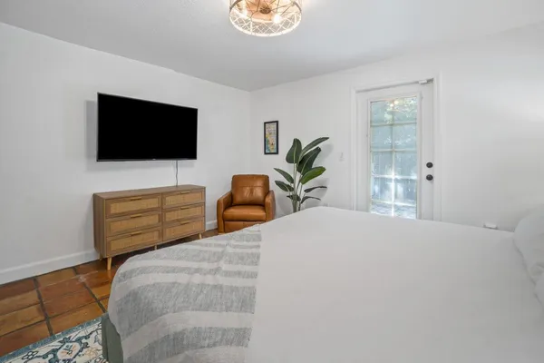 a view of an outdoor space with a table and chairs