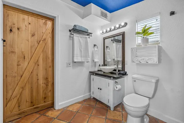 a view of outdoor sitting area with furniture