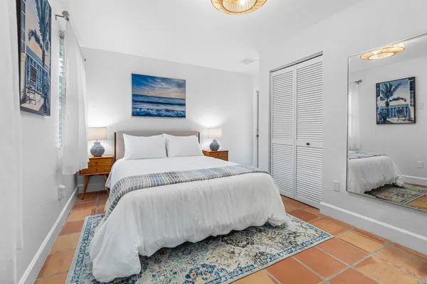 an aerial view of a houses with a yard