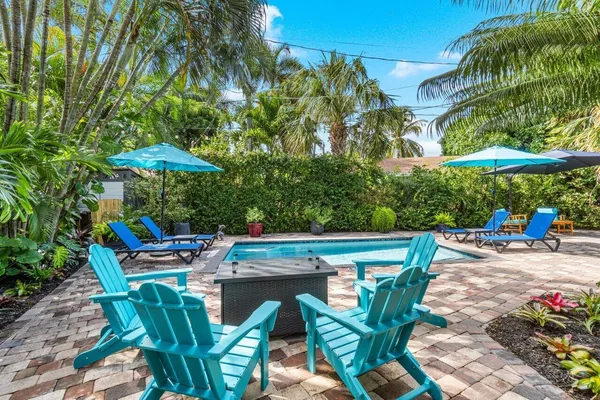 a view of a livingroom with furniture and window
