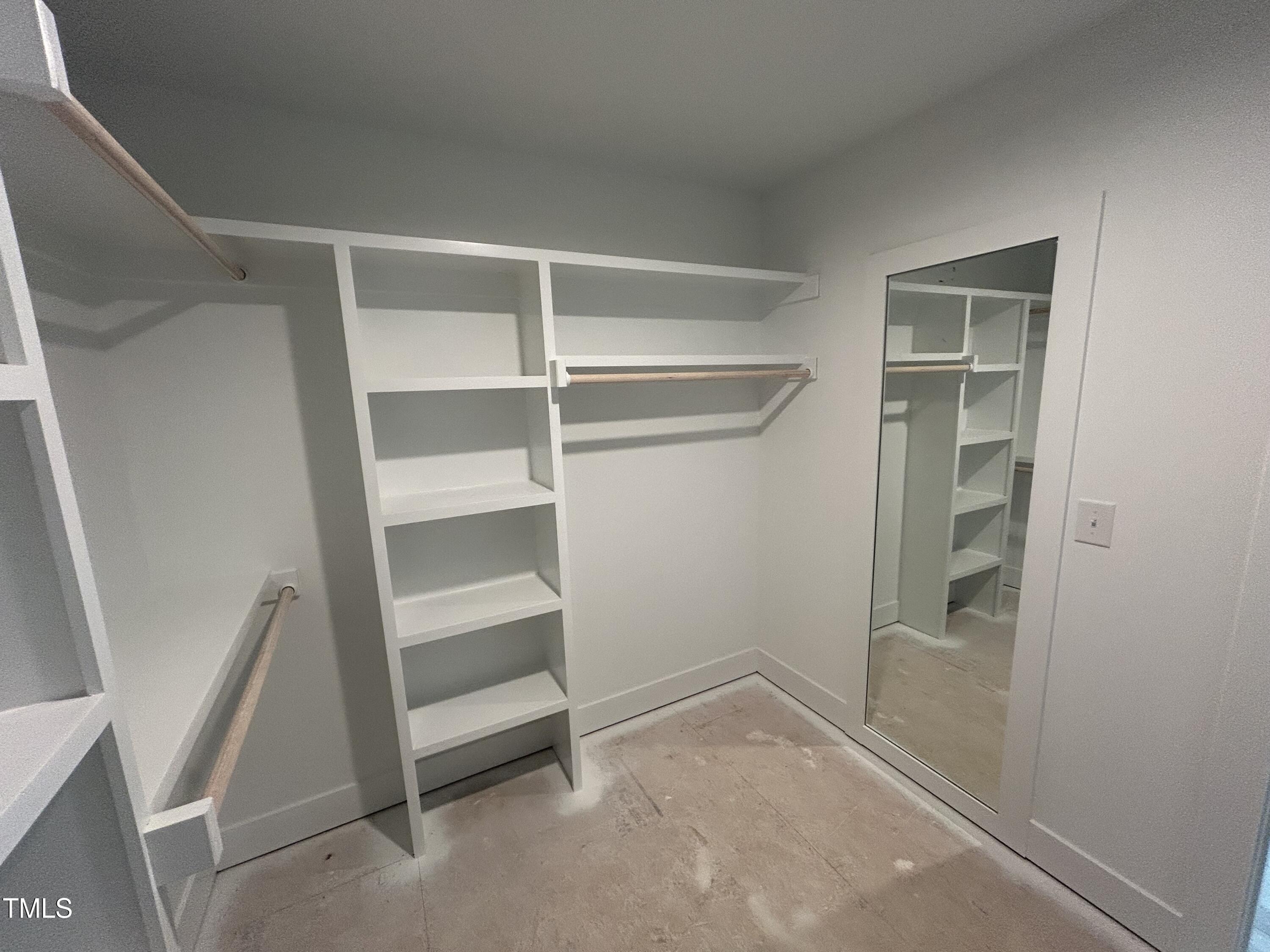 701 Locust Lane Raleigh, NC 27603 - Photo 11 of 19 a view of an empty walk in closet
