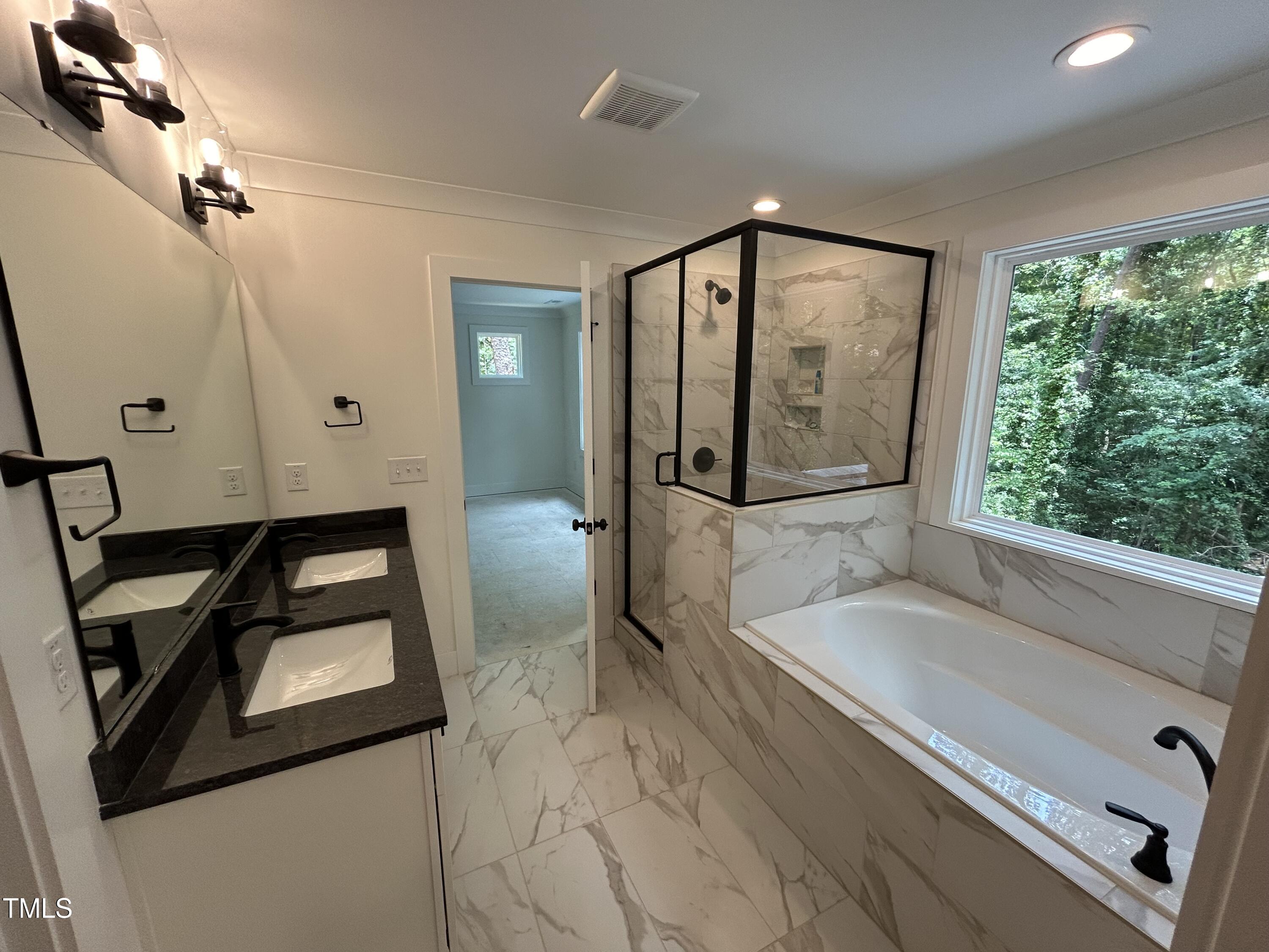 701 Locust Lane Raleigh, NC 27603 - Photo 9 of 19 a bathroom with a sink and a mirror