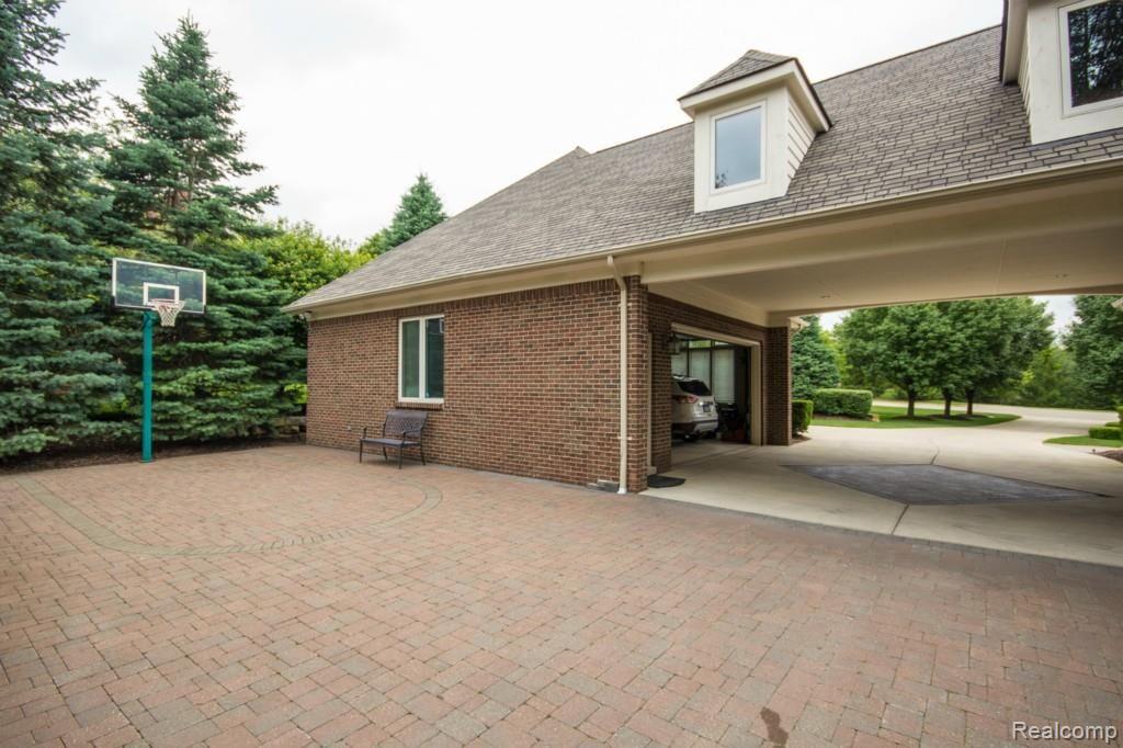 590 Sheldon Court Rochester, MI 48306 - Photo 11 of 99 11 Rear of Home Pavers.jpg