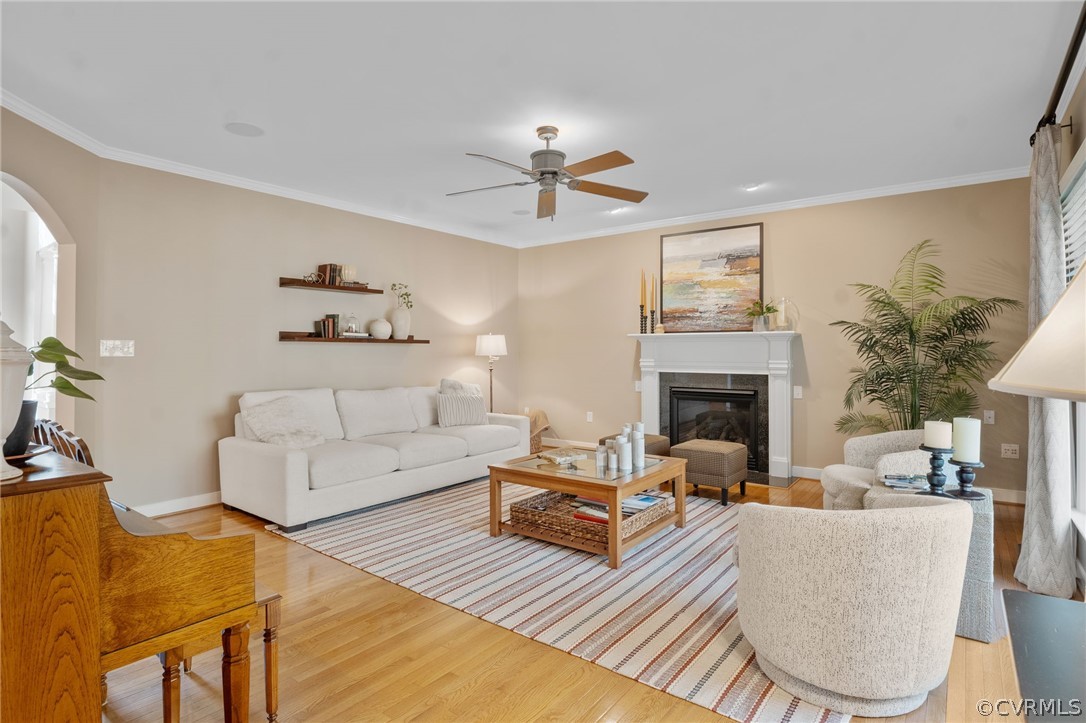 2713 Founders Bridge Road Midlothian, VA 23113 - Photo 18 of 49 a living room with furniture a fireplace and a table