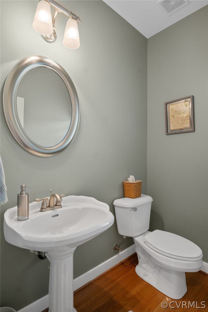 2713 Founders Bridge Road Midlothian, VA 23113 - Photo 20 of 49 a bathroom with a toilet a sink and mirror