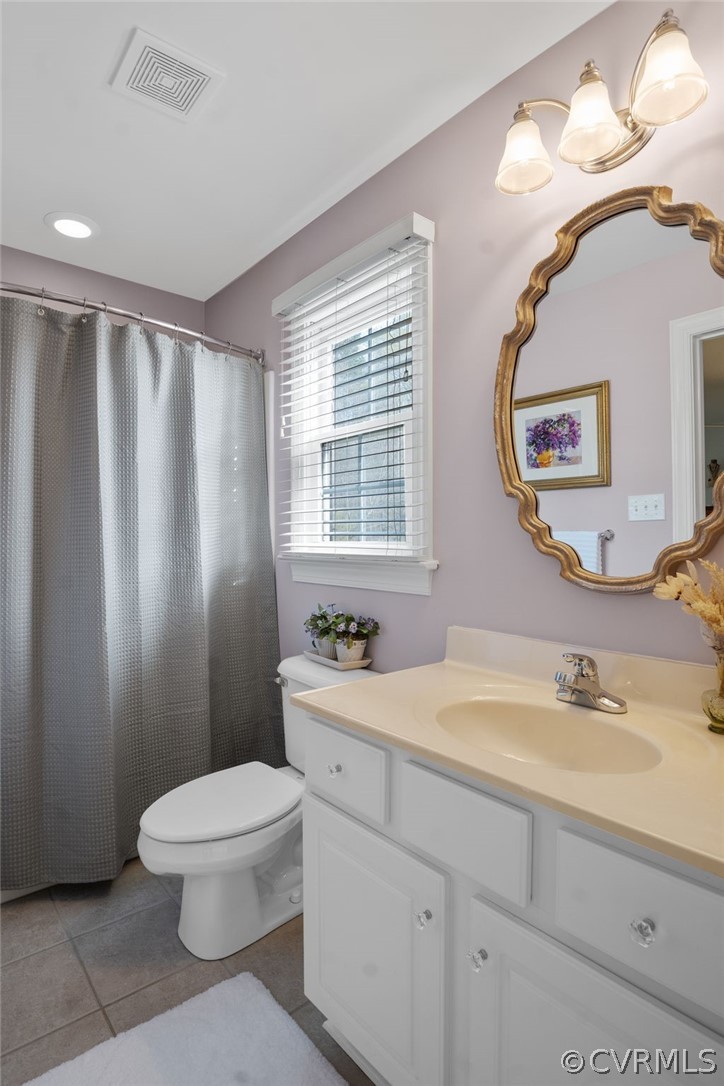 2713 Founders Bridge Road Midlothian, VA 23113 - Photo 30 of 49 a bathroom with a sink a toilet and a mirror