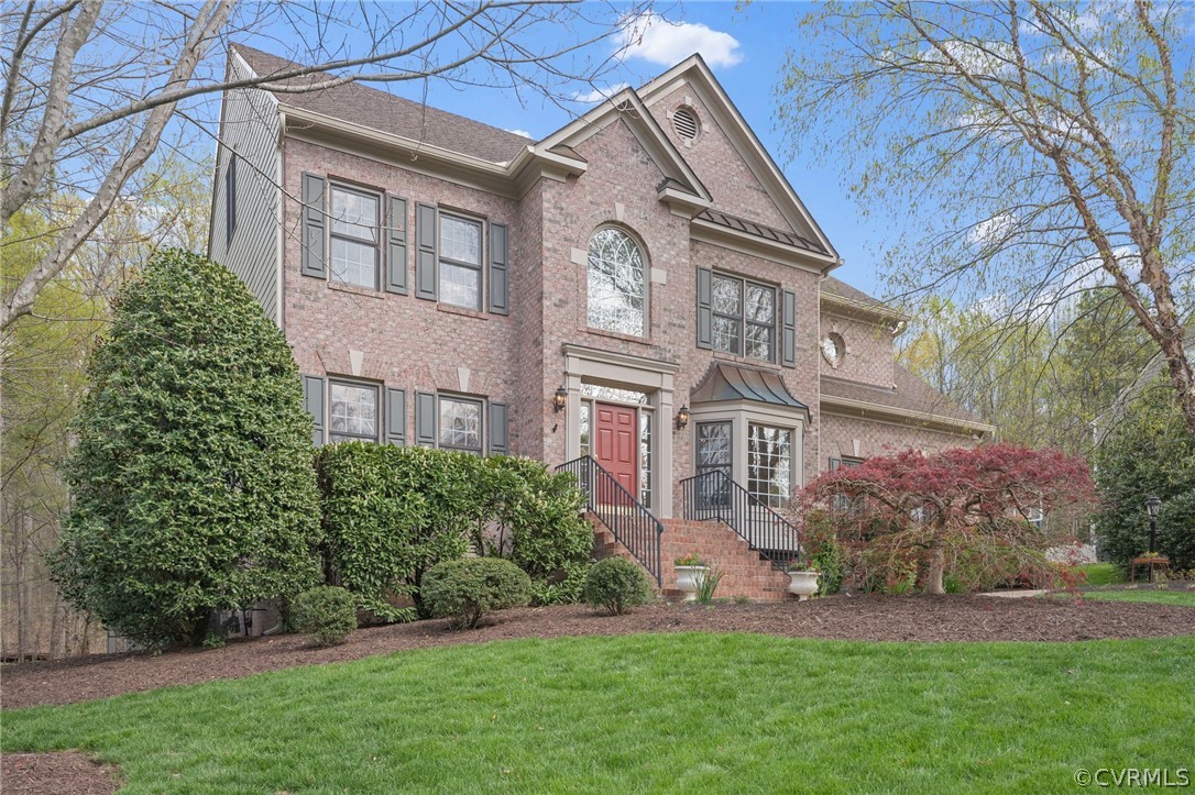 2713 Founders Bridge Road Midlothian, VA 23113 - Photo 3 of 49 a front view of a house with a garden