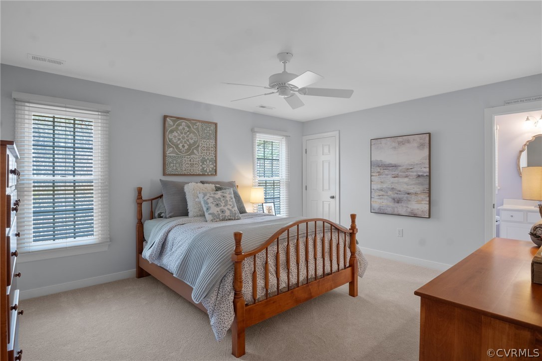 2713 Founders Bridge Road Midlothian, VA 23113 - Photo 31 of 49 a bed sitting in a bedroom next to a window