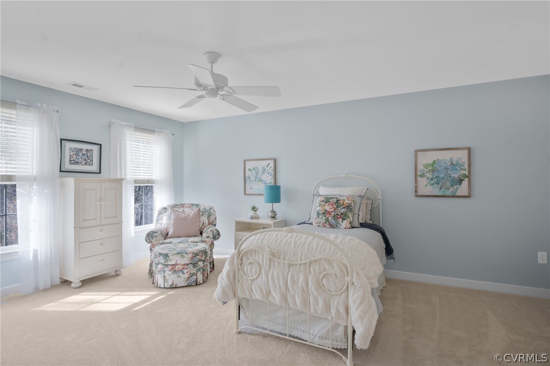 2713 Founders Bridge Road Midlothian, VA 23113 - Photo 32 of 49 a bedroom with bed and a chandelier