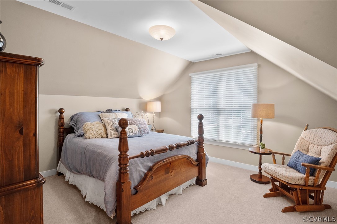 2713 Founders Bridge Road Midlothian, VA 23113 - Photo 34 of 49 a bedroom with a bed and a chair