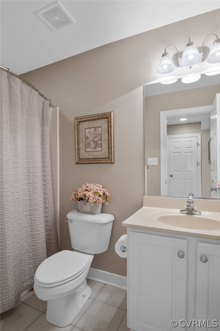 2713 Founders Bridge Road Midlothian, VA 23113 - Photo 35 of 49 a bathroom with a toilet a sink and mirror
