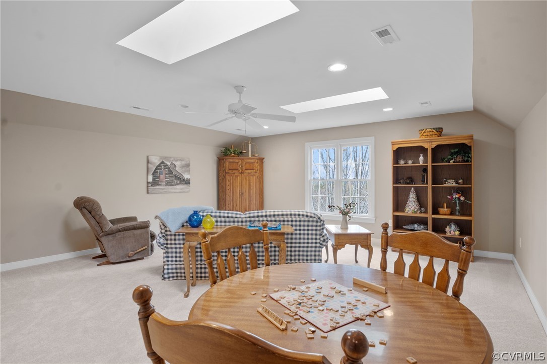 2713 Founders Bridge Road Midlothian, VA 23113 - Photo 36 of 49 a view of a dining room and livingroom with furniture wooden floor and windows