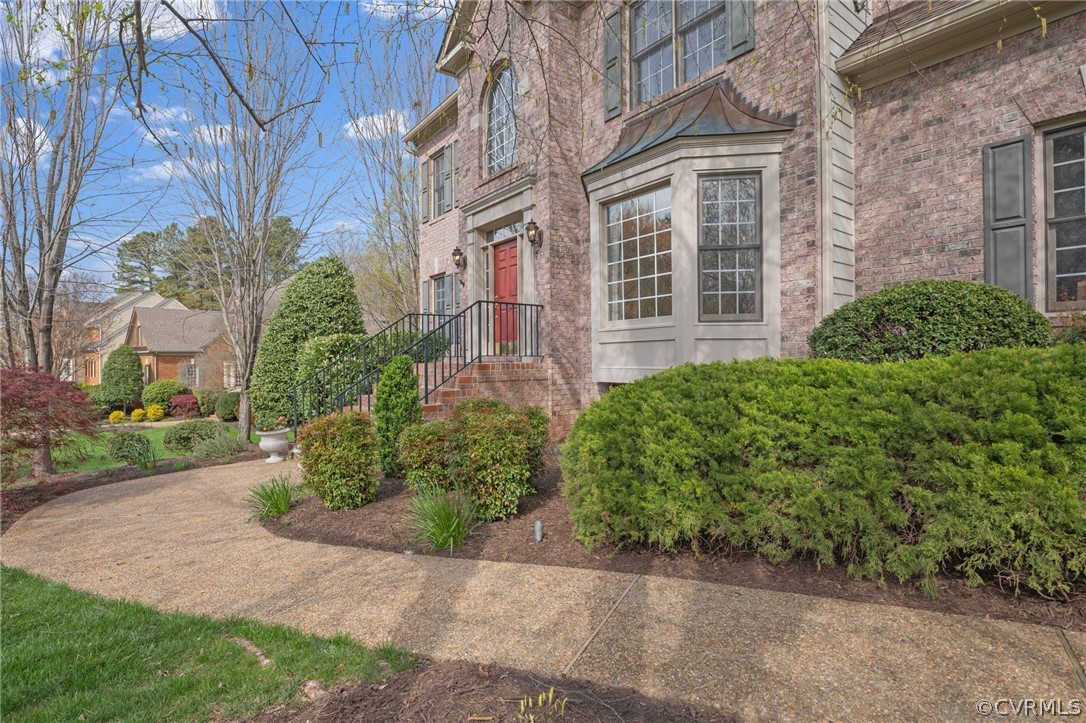 2713 Founders Bridge Road Midlothian, VA 23113 - Photo 5 of 49 a view of a building with a garden