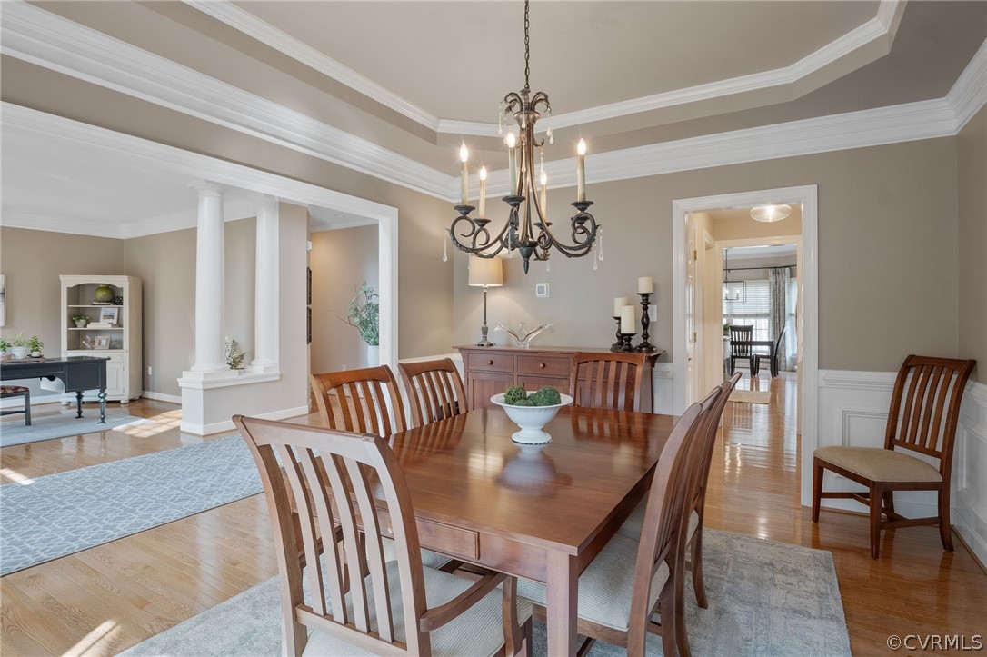 2713 Founders Bridge Road Midlothian, VA 23113 - Photo 10 of 49 a view of a dining room with furniture and a chandelier