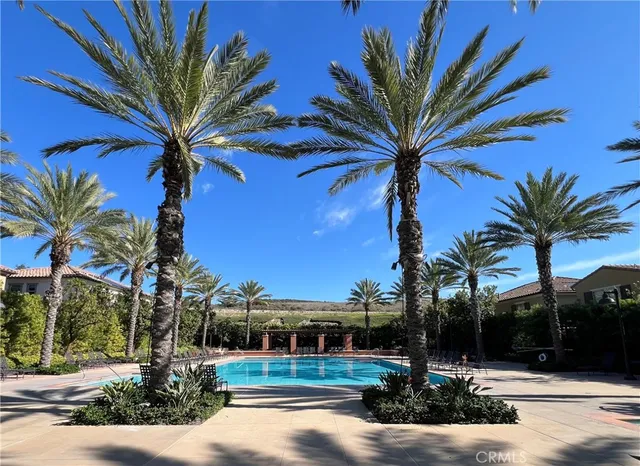 a view of a palm trees in front of a building