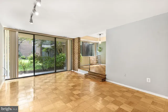 a view of an empty room and window
