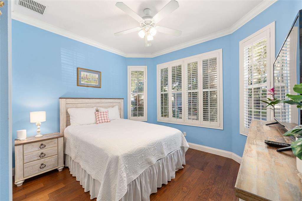 3304 Southwest 38th Street Ocala, FL 34474 - Photo 18 of 21 a bedroom with a large bed and a window