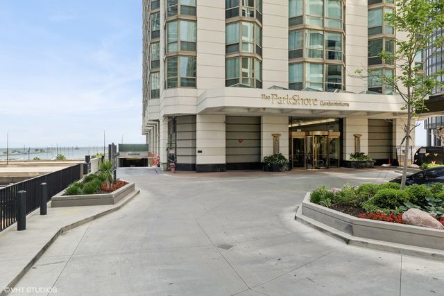 a view of a building with a garden