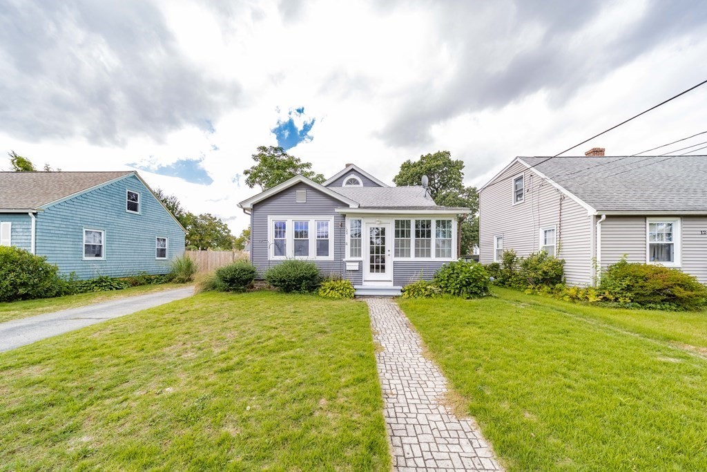 120 Winton Street Springfield, MA 01118 - Photo 1 of 25 a front view of a house with garden