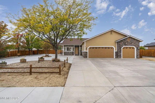 a view of house with outdoor seating