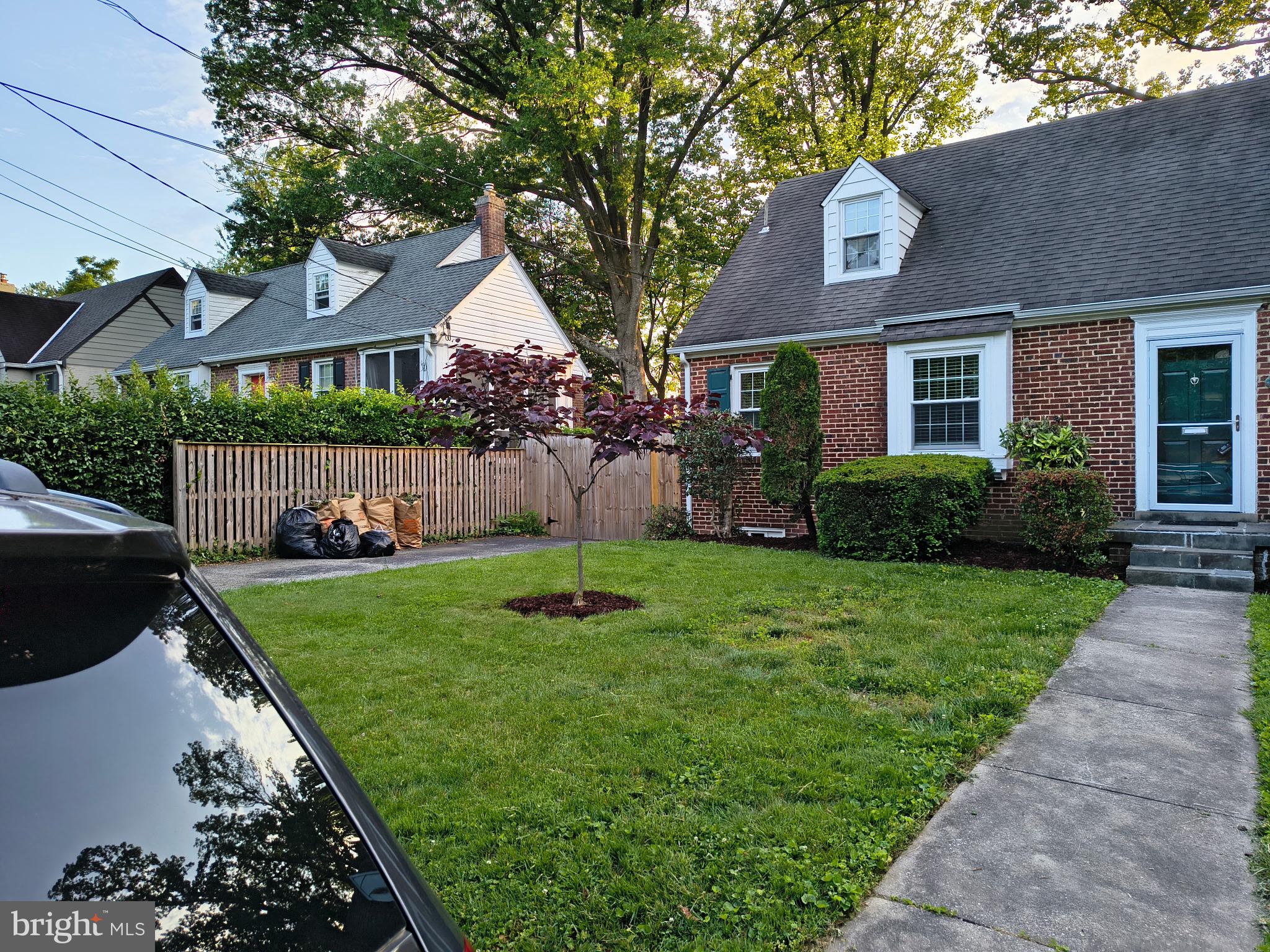 9316 Sudbury Road Silver Spring, MD 20901 - Photo 17 of 19 a front view of a house with garden