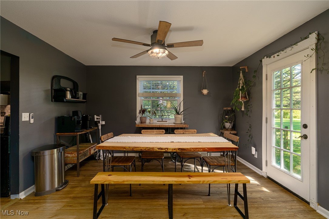 37340 Capel Road Grafton, OH 44044 - Photo 11 of 50 Spacious dining area with ceiling fan and a door to easily access the fenced in area for your 4-legged friends