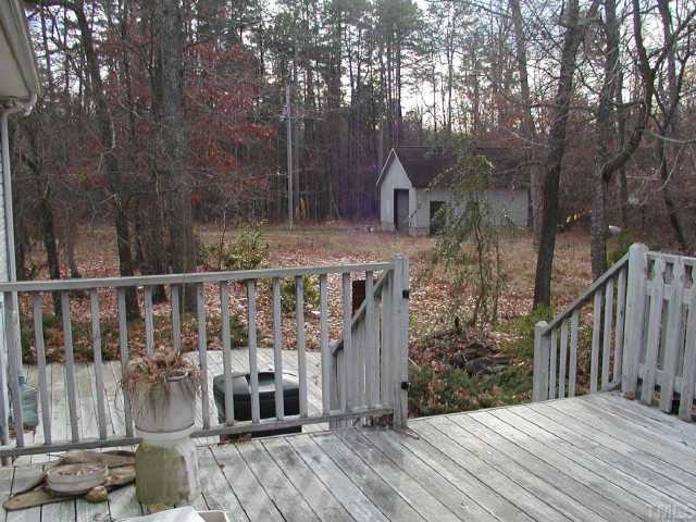 6516 Pentecost Road Cedar Grove, NC 27231 - Photo 10 of 11 Part of large deck looking toward the lower deck/patio area.