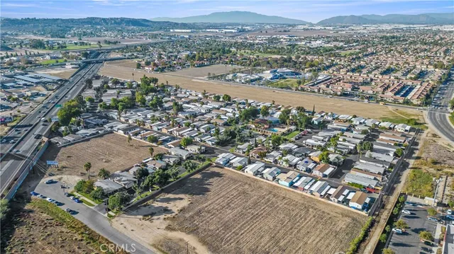 an aerial view of city and lake