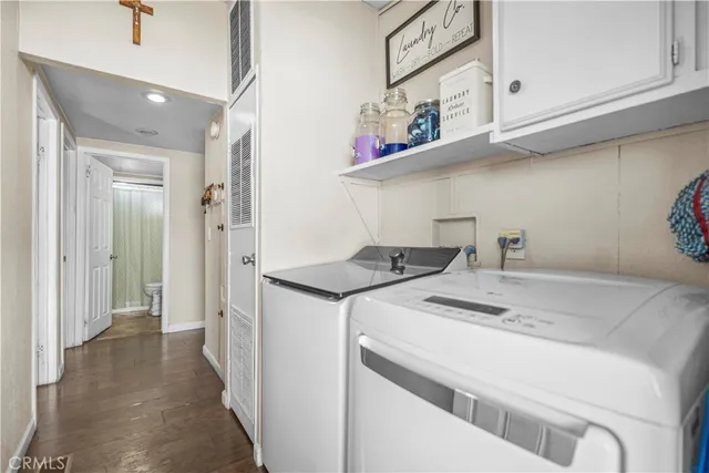 a kitchen with stainless steel appliances granite countertop a sink and a stove