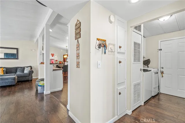 a view of livingroom with furniture and wooden floor