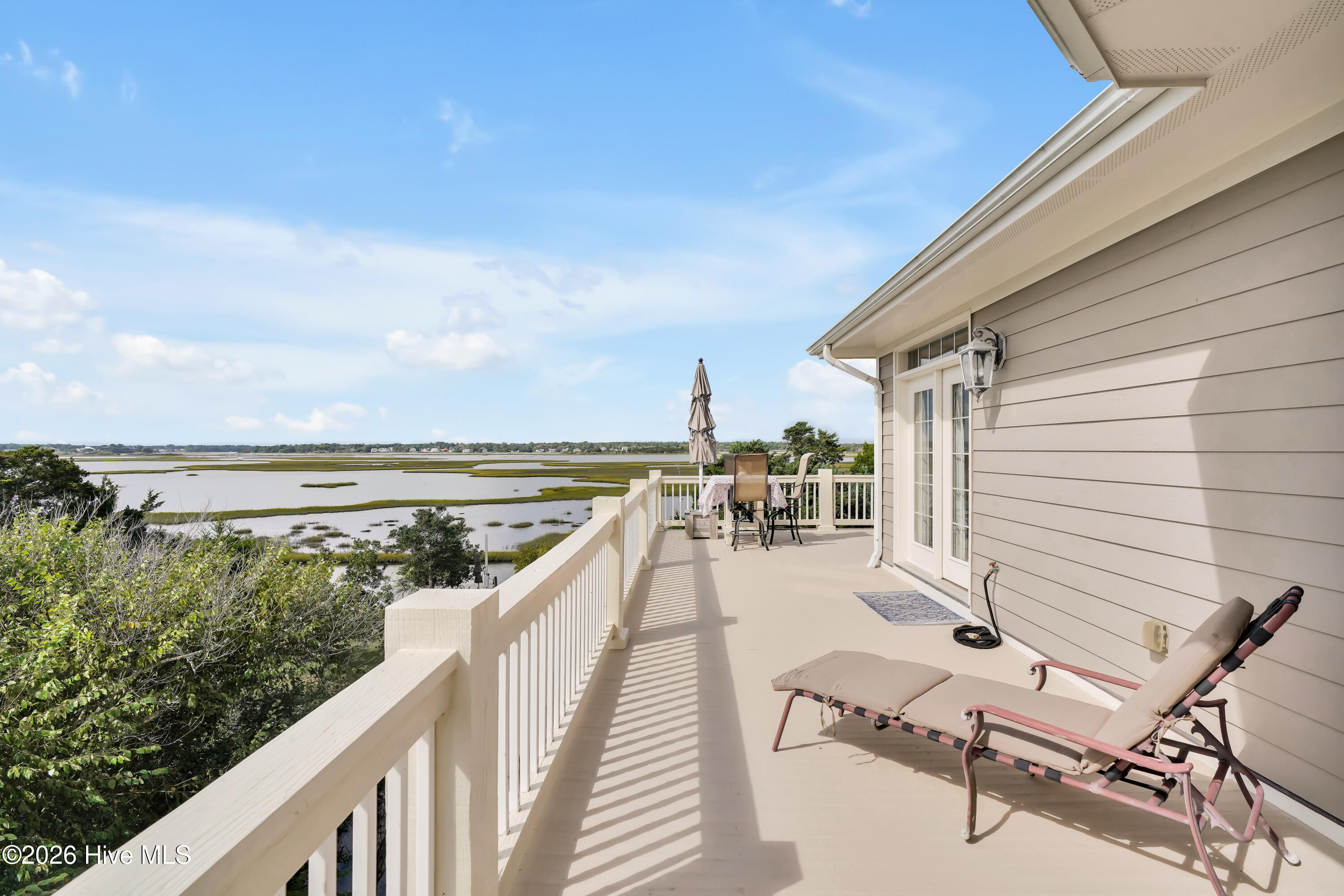 10 W Ridge Surf City, NC 28445 - Photo 28 of 86 layout area and view from bedroom 2 entrance to balcony