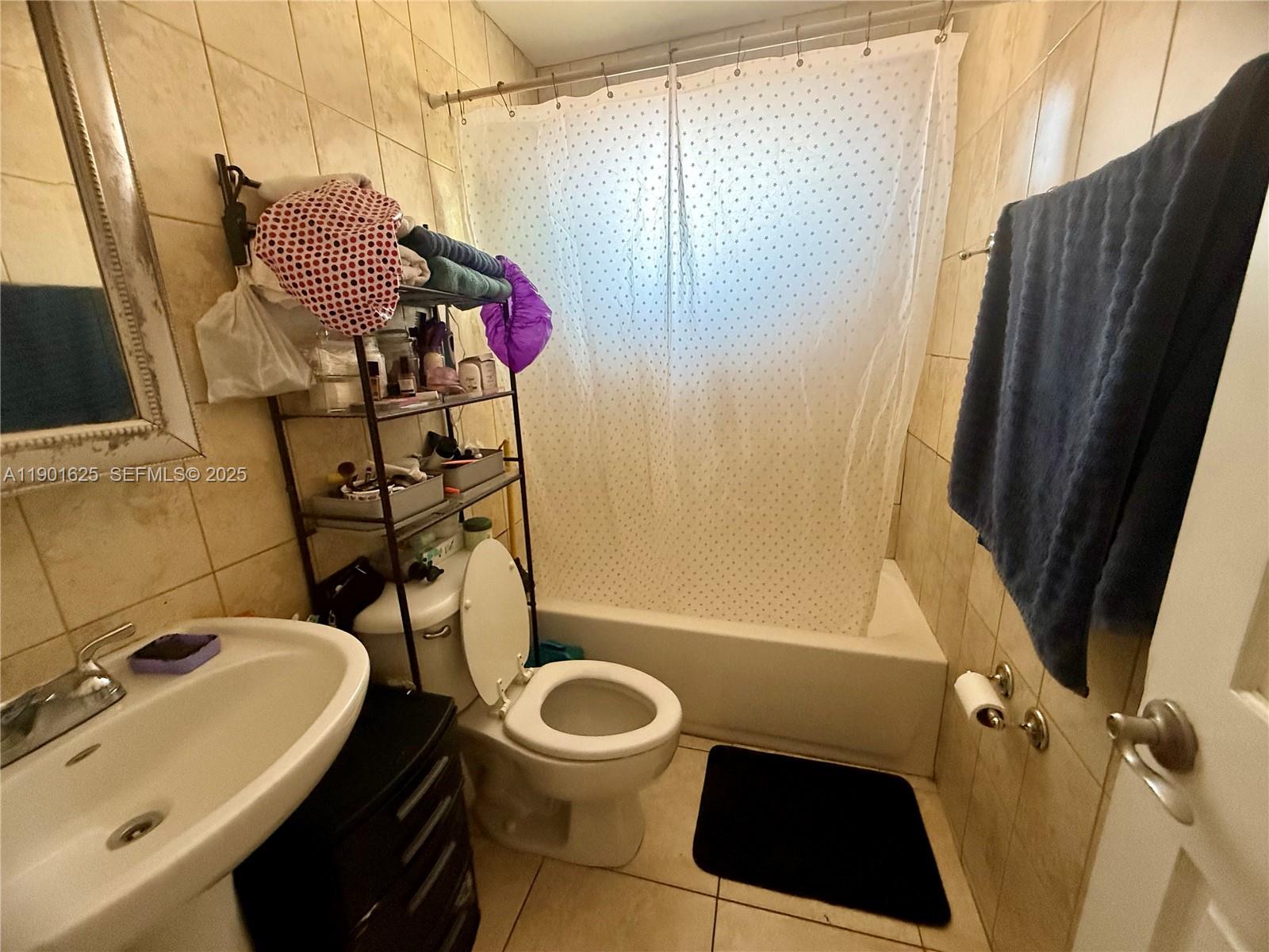 4201 Southwest 7th Street Miami, FL 33134 - Photo 11 of 23 a bathroom with a sink toilet and shower