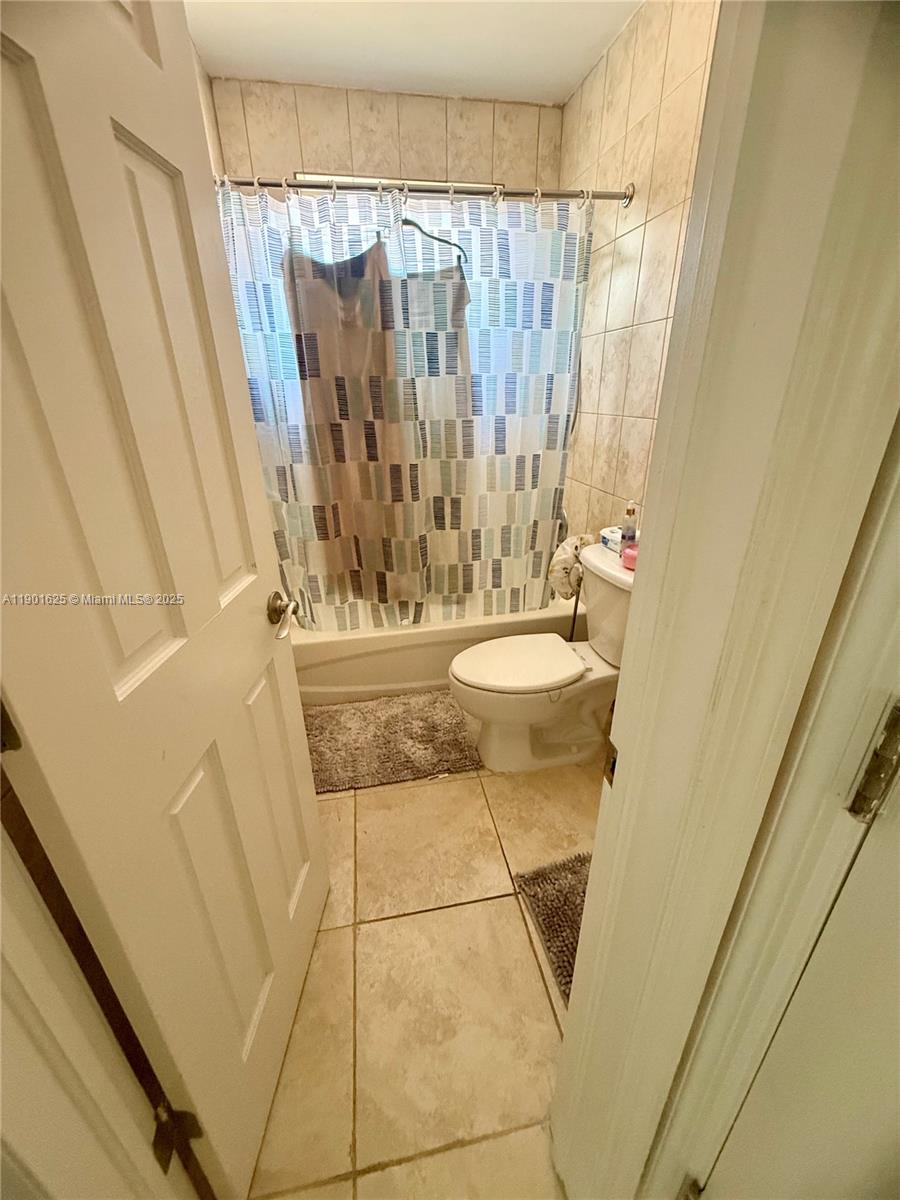 4201 Southwest 7th Street Miami, FL 33134 - Photo 17 of 23 a bathroom with a sink and a mirror