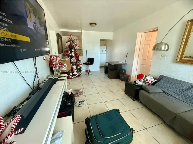a living room with furniture and a couch