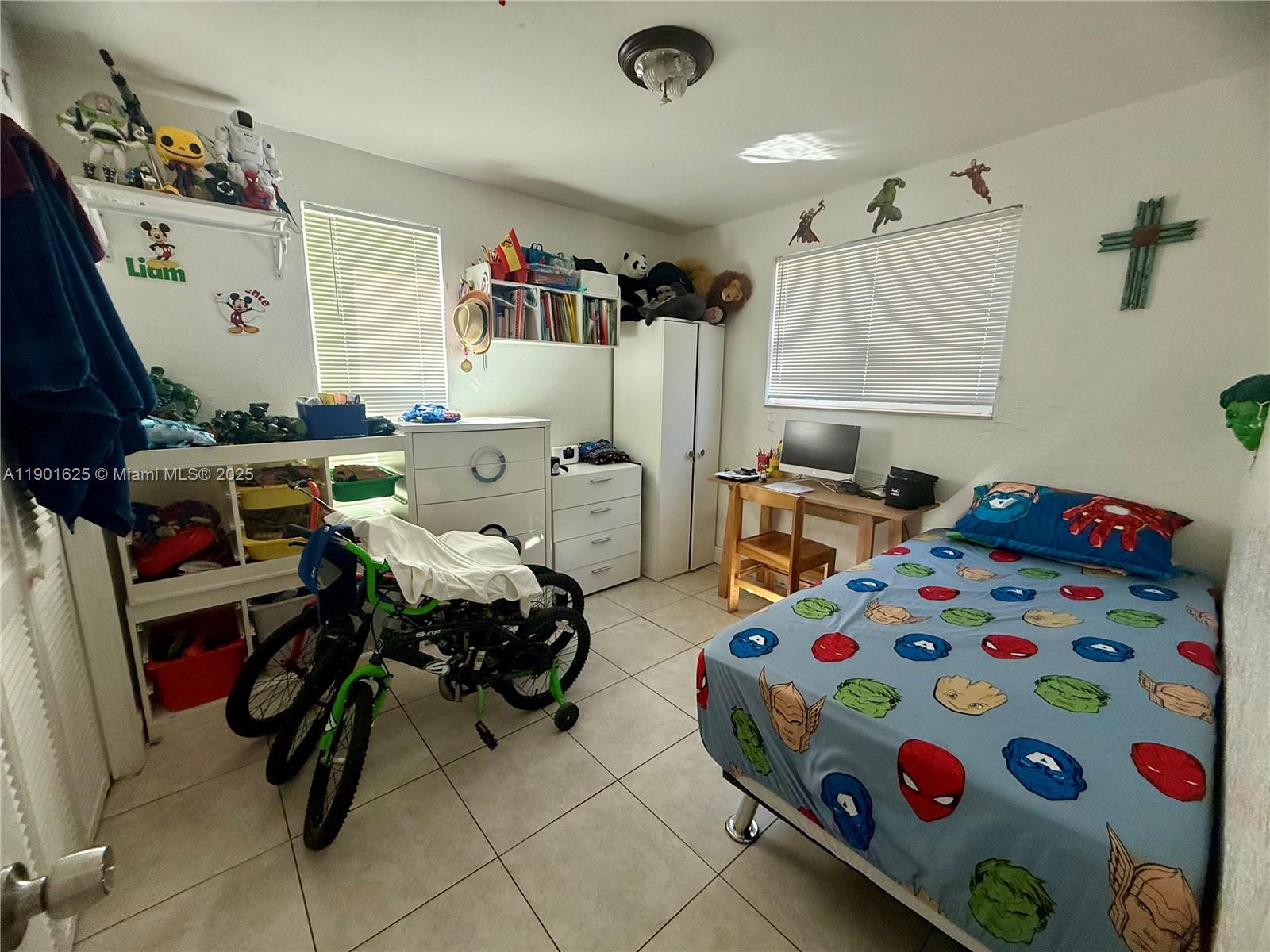 4201 Southwest 7th Street Miami, FL 33134 - Photo 22 of 23 a bedroom with bed and a window