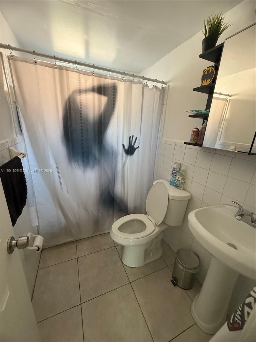 4201 Southwest 7th Street Miami, FL 33134 - Photo 23 of 23 a bathroom with a toilet and a shower
