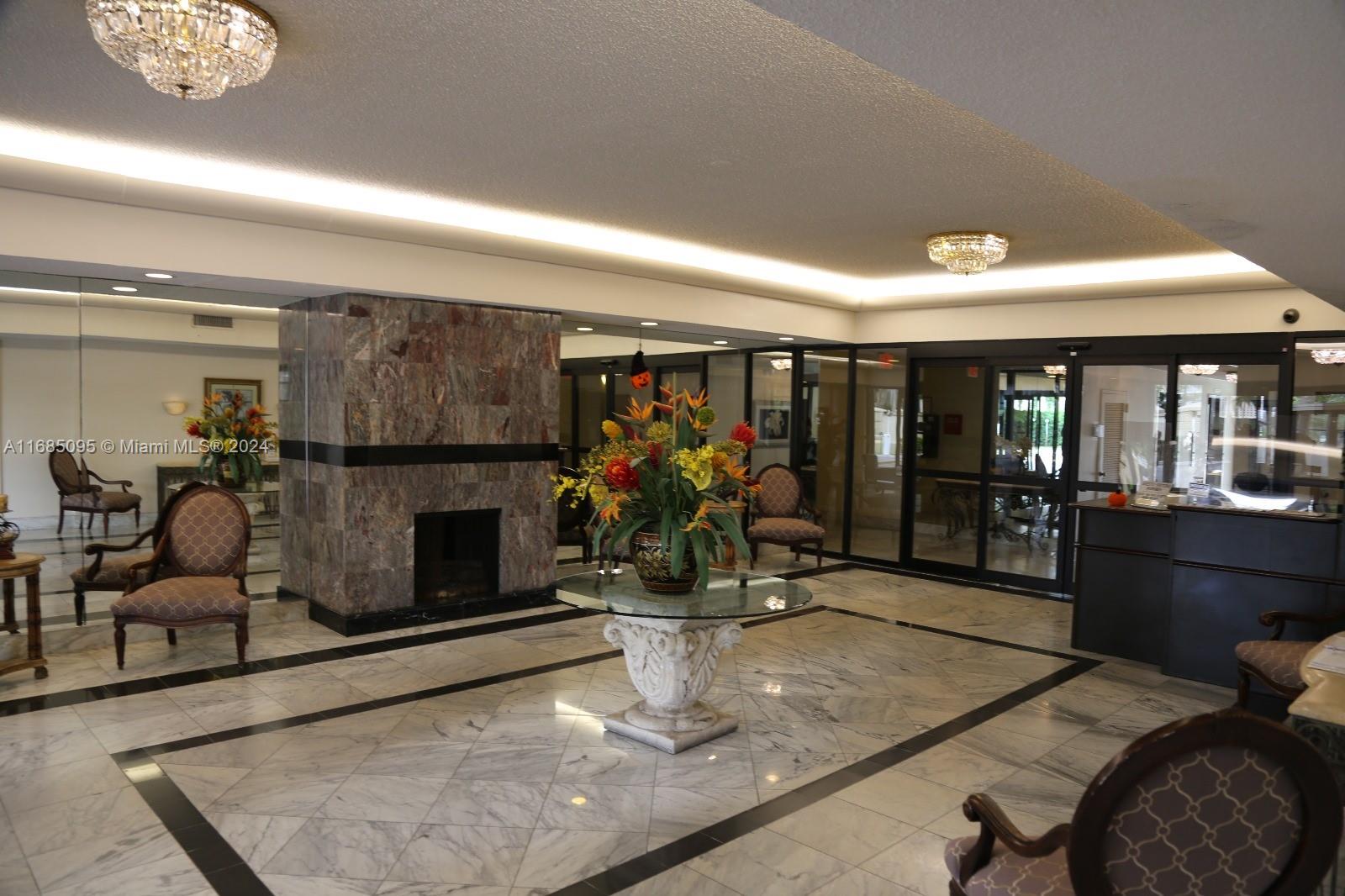 800 Northeast 195th Street, Unit 501 Miami, FL 33179 - Photo 31 of 39 a room with lots of gym equipment