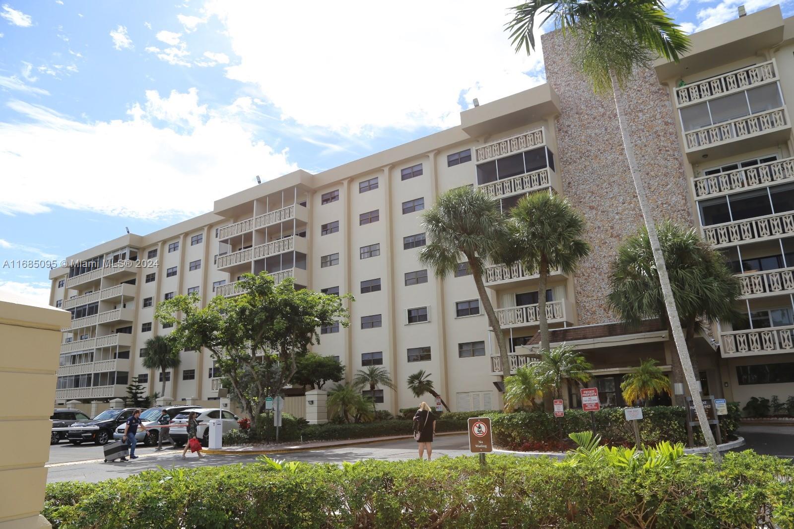 800 Northeast 195th Street, Unit 501 Miami, FL 33179 - Photo 32 of 39 a front view of a building